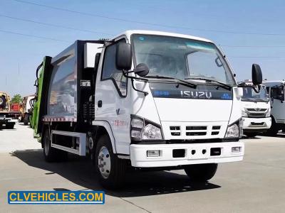 China N Series ISUZU Garbage Compactor Air Suspension 6 Tons Hydraulic Lift for sale