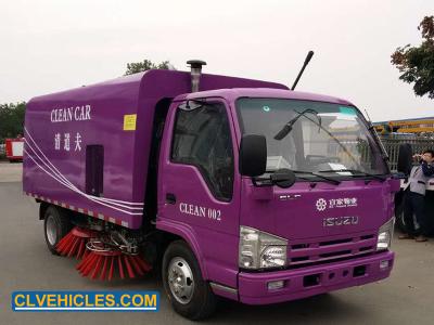 China Diésel ISUZU camión de barrido de carreteras 2000L tanque de agua 3000L depósito de basura polvo en venta