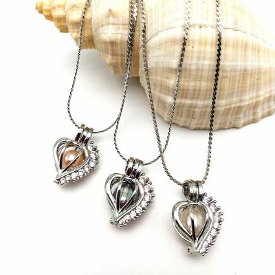 China Top Grade Women Pearl Heart Cage Zircon Pendant Necklace for Birthday Gift for sale