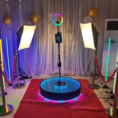 China Adjustable LED 360 Photo Booth Glass Platform Selfie Rotating Photo Booth for sale