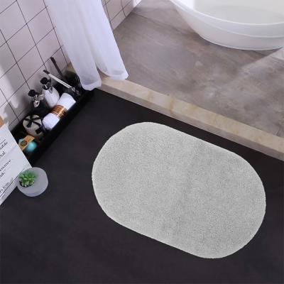 China Latex Backing Non Shedding Tufted Bath Mats Oval Shaped Environmental for sale
