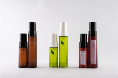 China Amber Green Plastic Lotion Custom Cosmetic Bottles Set / Foundation Pump Bottle for sale