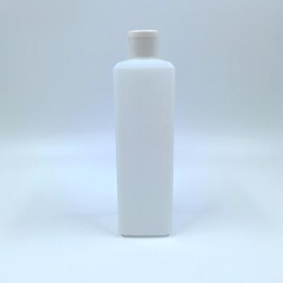 China PE Plastic Rectangle White Shampoo Lotion Bottle 900ml With Clamshell Cap for sale