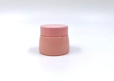 China Los tarros cosméticos plásticos 50ml 300ml del ANIMAL DOMÉSTICO del rosa de Subulate con la máscara del pelo del disco facial friegan el empaquetado en venta