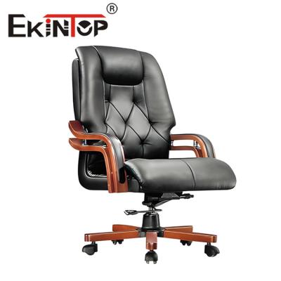 China Massage Black Executive Leather Chair Rotatable CEO Office Boss Chair for sale