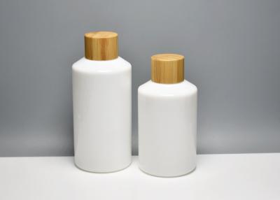 China BG-106X(1), 100ml 150ml opal white glass bottle with bamboo screw cap, eco friendly cosmetic glass containers wholsale for sale