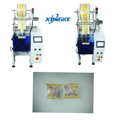 China Small Business Eraser Study Products Packing Plastic Film Roll Packaging Machine for sale