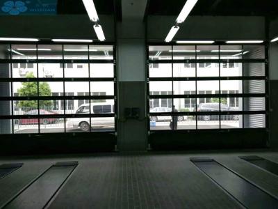 China Transparent PC Glass Commercial Sectional Garage Doors for sale