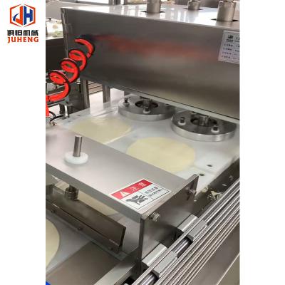 China Roti Canai Processing Machine with Adjustable Bread Size 5500-8600pcs/h Capacity en venta