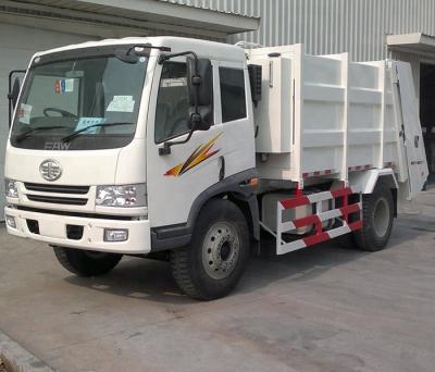 China FAW 4x2 J5K 7CBM Compression Garbage Compactor Truck 7100x2250x2750mm for sale