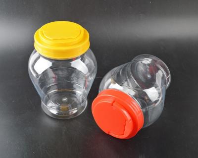 China Tapa espesada capacidad llana multi plástica de la botella de la miel del tanque de almacenamiento de la comida en venta
