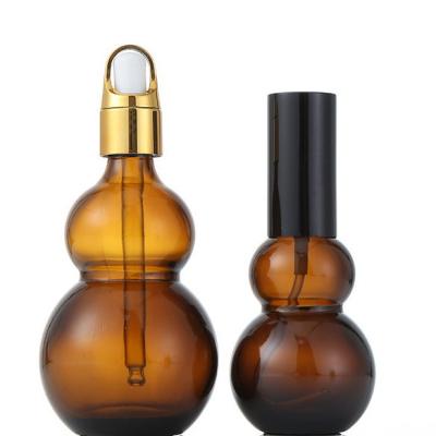 China Uniform Spray Volume Essential Oil Dropper Bottles , 30ml / 50ml Amber Glass Bottles for sale