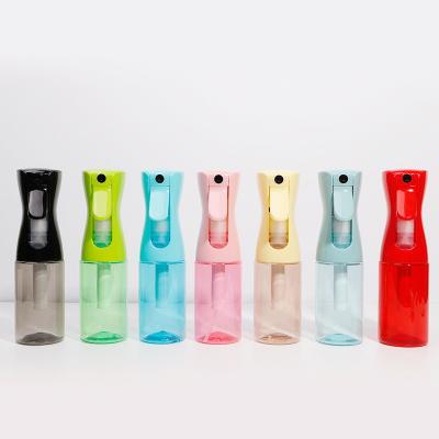China Continuous Spray Bottle Pump Gardening Watering Flower Macaron Watering Bottles for sale
