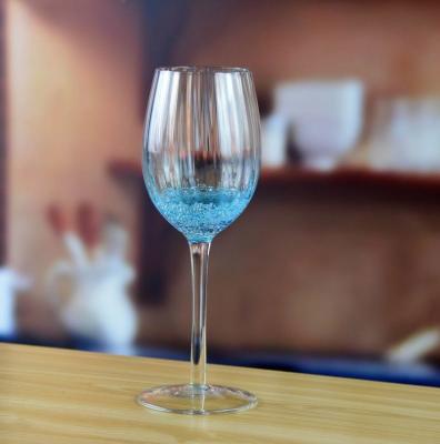 China Handmade Ocean Blue Wine Goblet Glass With Sparkling Bubbles for sale