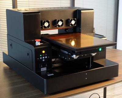 China Automatic Uv Flatbed Printer A3 Inkjet Uv Printing Machine for sale