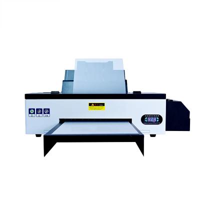 China OEM ODM L1800 DTF Impresora a chorro de tinta Rolos de película de tinta para curar horno Shaker Impresora en venta