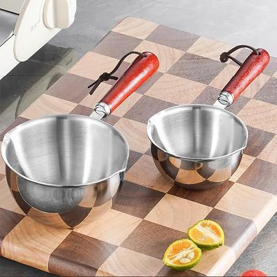 China New Arrival Cooking Pot 18/8 Stainless Steel Frying Egg Pot Pan Cooking Pan Spilled Oil Pot With Wooden Handle for sale