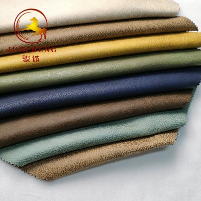 China 100% Polyester Bronzed Foil Embossed Faux Suede Fabric for sale