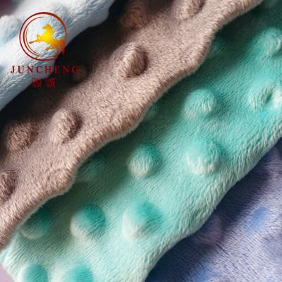 China wholesale Super soft 100% polyester Baby Cuddle Minky Dot Plush Fabric à venda