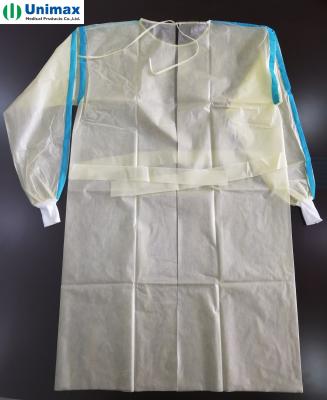 China AAMI 3 PP revestiu vestidos descartáveis do isolamento do PE com o punho feito malha 40gsm à venda