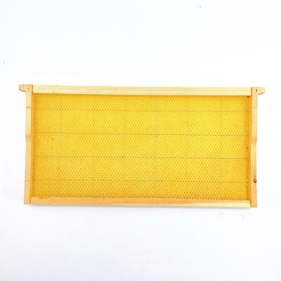 China Bee natural processing honeycomb beeswax heightened nest foundation with wooden frame beehive tool for sale