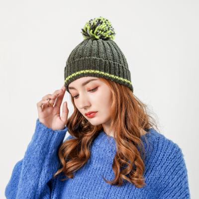 China COMMON Custom Pom Pom Hats Knit Luxury Designer Winter Hats for Warmly Unisex Pompom Beanies for sale