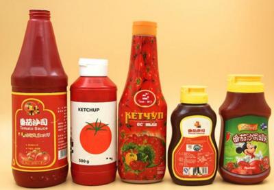 Chine chaîne de production de mise en bouteilles de l'huile de noix de coco 220V comestible 1500BPH à vendre