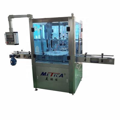 China High Speed Rotary Type Bottle Capping Machine With Twin Heads for sale