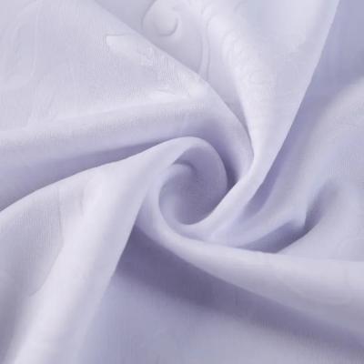 Chine Stretch Blanc 3D Polyester spandex tricoté tissé plongeur sur mesure Tissu en relief pour femmes à vendre