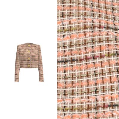 Cina 100% di poliestere di lino di tessuto di tweed colorato Checks grezzi di lana finta di tweed di tessuto nero in vendita