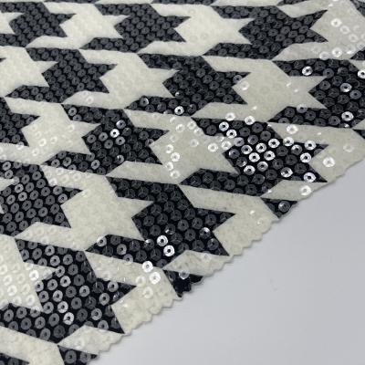 China Tejido de prendas de vestir Sequins impermeables Tejido bordado M13-010 en venta