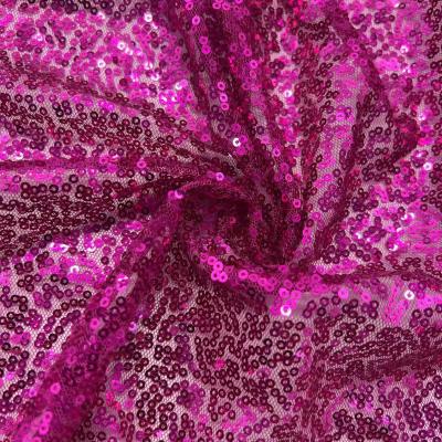 China Glitzy Sequins Embroidery Design 100% polyester paarse stof voor doek Te koop