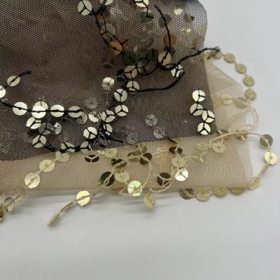 China Tela de seda de malha bordados 100%P ouro seda adicionar diferença tecido líquido para o vestido à venda