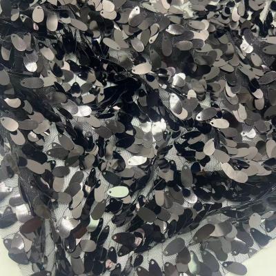 China classic sequins embroidery fabric black color 100% polyester fabric for decorate clothes à venda