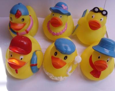 China Mini Yellow Bathtub Weighted Squeezing Rubber Ducks Surfing / Swimming Design for sale