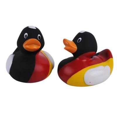 China Promotion Flag Design Squeezing Rubber Ducks National Patriot Soft Squeezing Duck for sale
