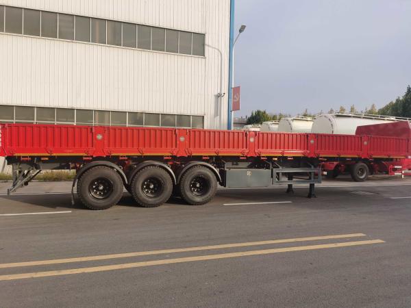 Quality 3 Axle Side Tilting Stake Cargo Trailer High Load Bearing Capacity for sale