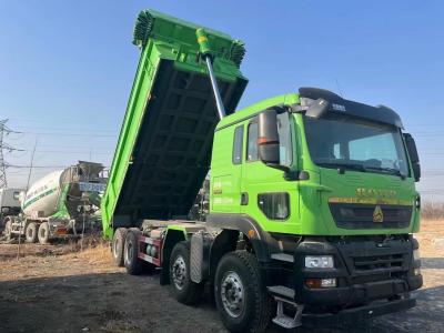 China Sinotruk Howo 8x4 Dump Truck Tipper 440hp 35 ton Gebruikte Dump Trailer Grote capaciteit Box Te koop