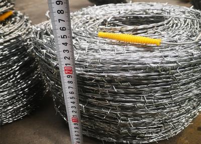 China Galvanized Double Twist Barbed Wire 20kg/Coil For Grass Boundary for sale