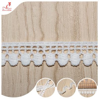 China Sustainable Crochet White Polyester Lace Trimmings Ribbon 1.3cm For Girl's Dress Skirt en venta