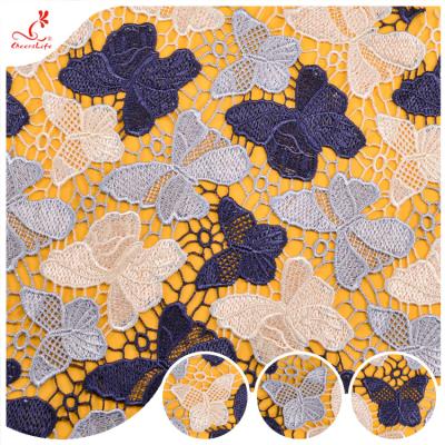 China 100% poliéster bordado flor e borboleta desenhos tricô França tecido de renda à venda
