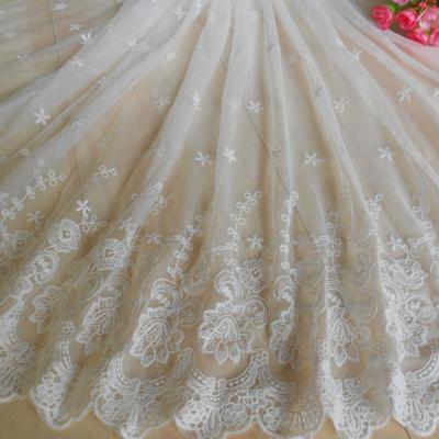 China Vintage Symmetrical Floral Nylon Lace Fabric For Wedding Dress With Scalloped Edge for sale