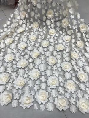 China 3D Embroidered Flower Beaded Wedding Gown Lace Fabric Anti-static Fashion for sale