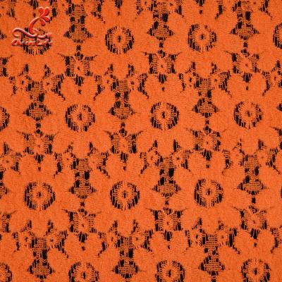 China Soft Fancy Burnt Orange Embroidered Lace Fabric For Saree Clothes for sale