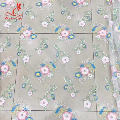 China Colorful Floral Embroidery Fabric With Sequins Swiss Mesh Volie Lace for sale