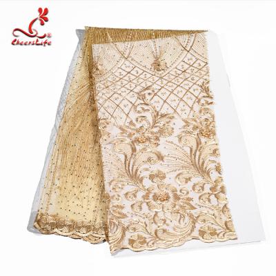 China O ouro da flor dos vestidos de nivelamento bordou tela frisada à venda