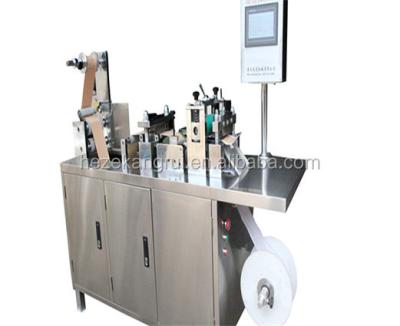 China Economical Electric KC-NGY-L Capsicum Plaster Perforating Machine for Case Packaging for sale