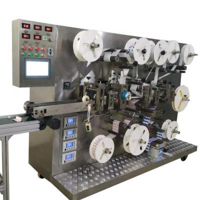 China Stainless Shell High Speed Medical Automatic Packing Machine KC-2000-D for Band Aid for sale