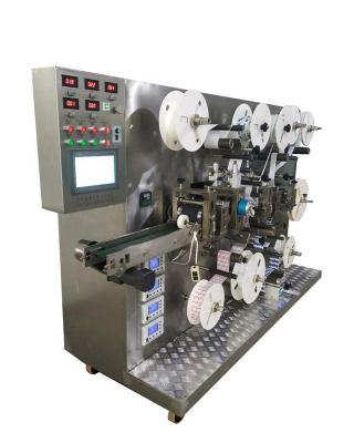 China KC-2000-D High Speed Colorful Adhesive Bandage Machine with Packaging and Making Part for sale