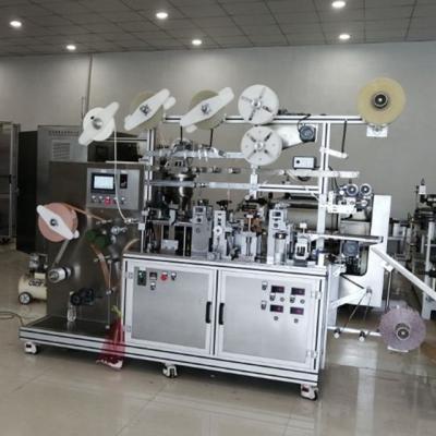 China KC-JYG-F Máquina totalmente automática de fabricação e embalagem de patches de remoção de calos de gesso de milho à venda